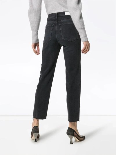 Shop Re/done Stovepipe Raw Hem Jeans In Black