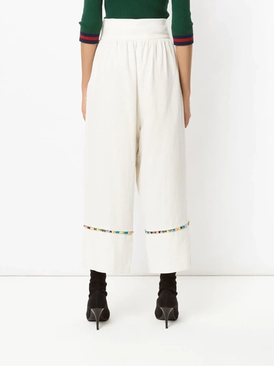 Shop Olympiah Inca Pompom Pantacourt Trousers In White