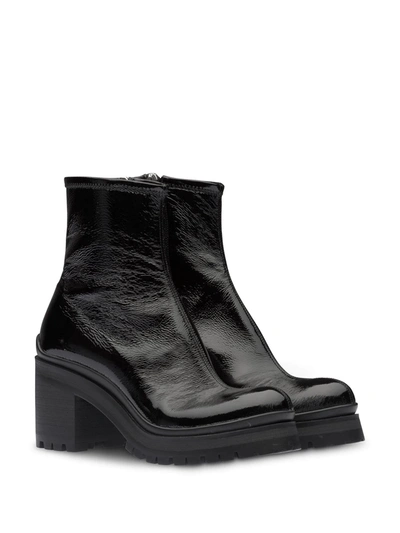 Shop Miu Miu Block Heel Ankle Boots In Black