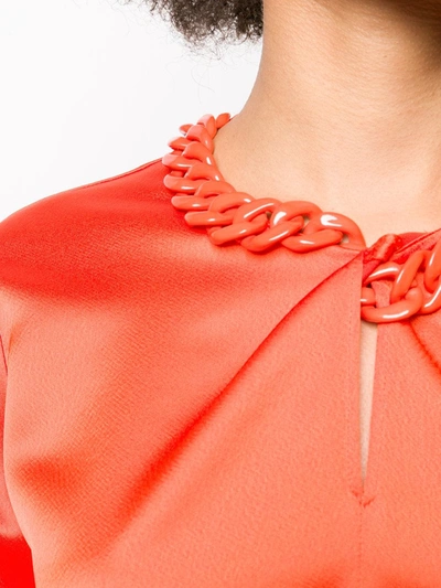 Shop Msgm Chain-neckline Satin Blouse In Orange