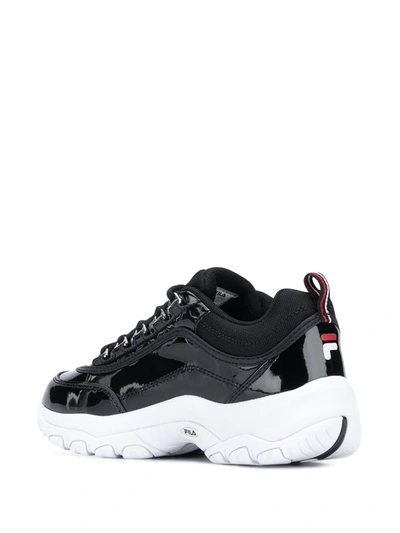 Shop Fila Strada Chunky Sole Sneakers In Black