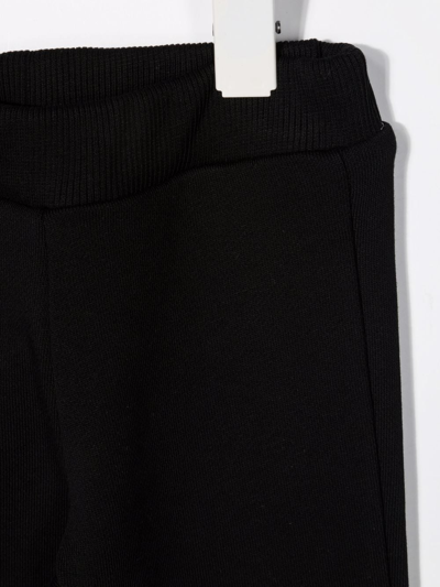 Shop Balmain Logo-print Cotton Trousers In Black