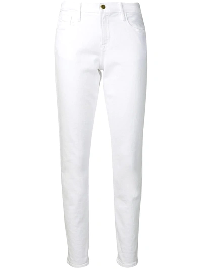 Shop Frame Le Garcon Mid-rise Jeans In White