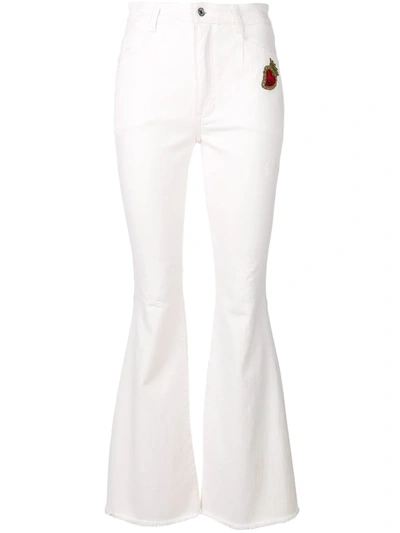 Shop Dolce & Gabbana Sacred Heart Patch Flared Jeans In White