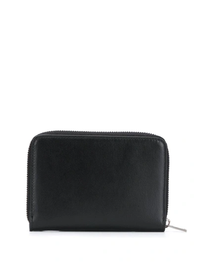 Jil Sander Embossed Logo Zip-around Wallet In Black