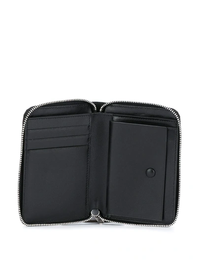Jil Sander Embossed Logo Zip-around Wallet In Black