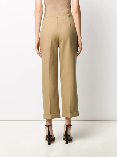 Shop Saint Laurent Cropped High-waisted Trousers In Neutrals