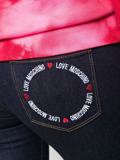 Shop Love Moschino Embroidered Logo Skinny Jeans In Blue