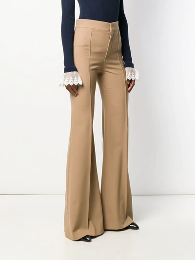 Shop Chloé High-waisted Flared Trousers In Neutrals