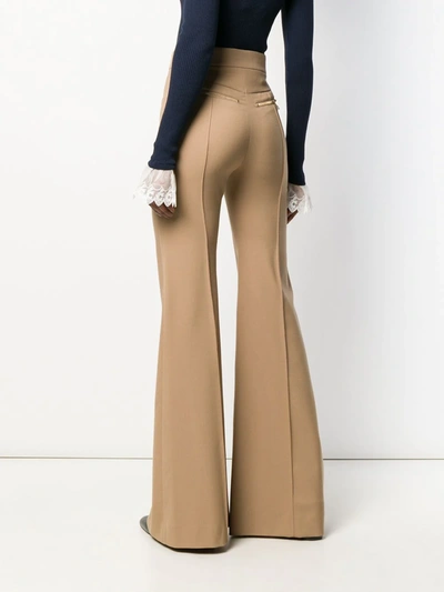 Shop Chloé High-waisted Flared Trousers In Neutrals