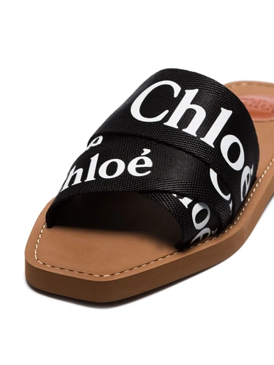 Shop Chloé Woody Logo Slides In Black