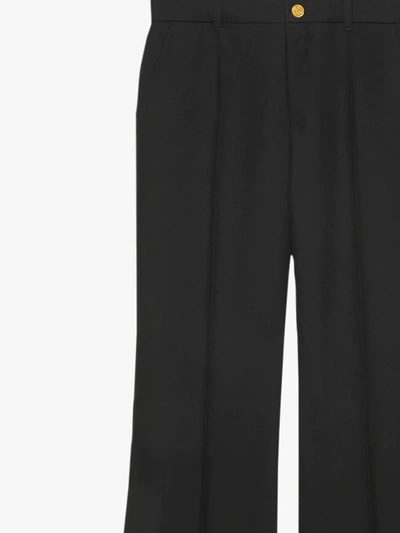 Shop Gucci Flared High-waisted Trousers In Black