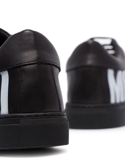 Shop Moschino Logo Low Top Sneakers In Black