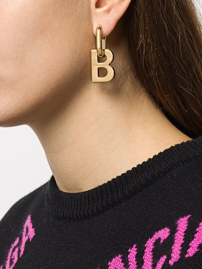 Shop Balenciaga B-logo Hoop Earrings In Gold