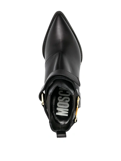 Shop Moschino M Plaque Ankle Boots In Black