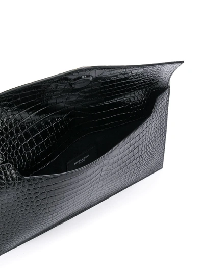 Shop Saint Laurent Uptown Crocodile-effect Clutch In Black