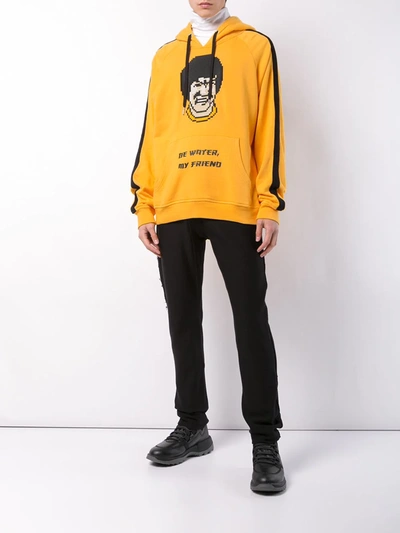 Shop Mostly Heard Rarely Seen 8-bit Be Water My Friend Hoodie In Yellow