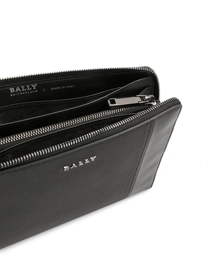 Shop Bally Zip-up Leather Clutch Bag In Black