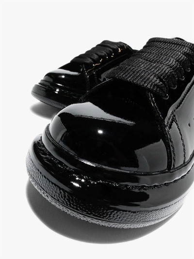 Shop Alexander Mcqueen Oversized Low-top Sneakers In Black