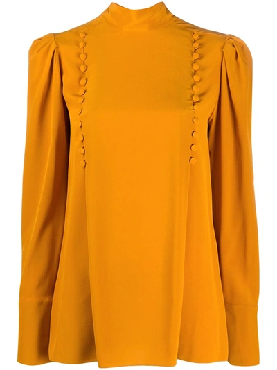 Shop Givenchy Button-embellished High-neck Blouse In Orange