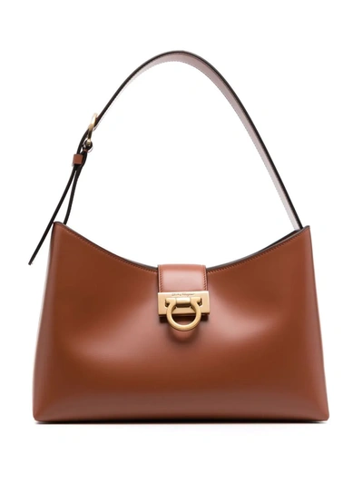 Shop Ferragamo Trifolio Leather Shoulder Bag In Braun