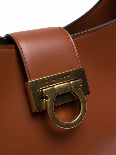 Shop Ferragamo Trifolio Leather Shoulder Bag In Braun