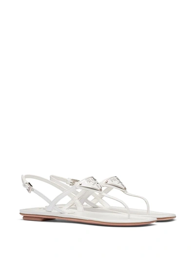 Prada Logo Metallic Leather Ankle-strap Thong Sandals In White