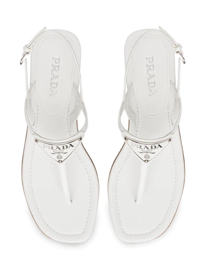 Prada Logo Metallic Leather Ankle-strap Thong Sandals In White