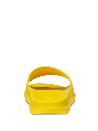 Shop Fendi Ff Embossed Logo Slides In Yellow