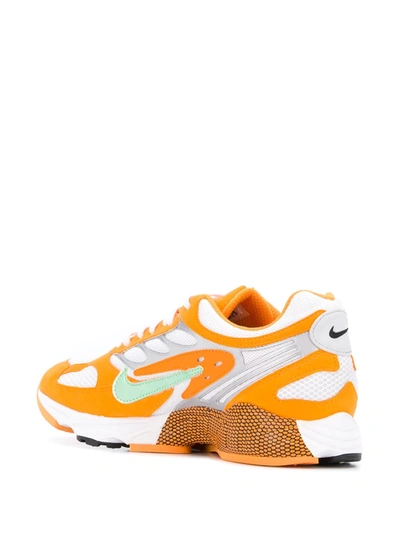 Shop Nike Air Ghost Racer Sneakers In Orange