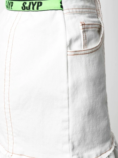 Shop Sjyp Raw-cut Denim Mini Skirt In White