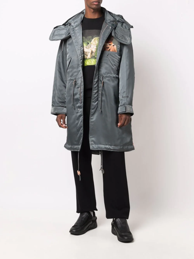 Shop Undercover Painterly-print Hooded Parka In 绿色