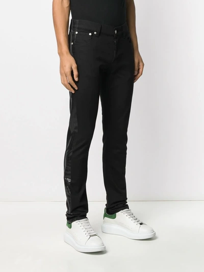 Shop Alexander Mcqueen Side Tape Straight Jeans In Black