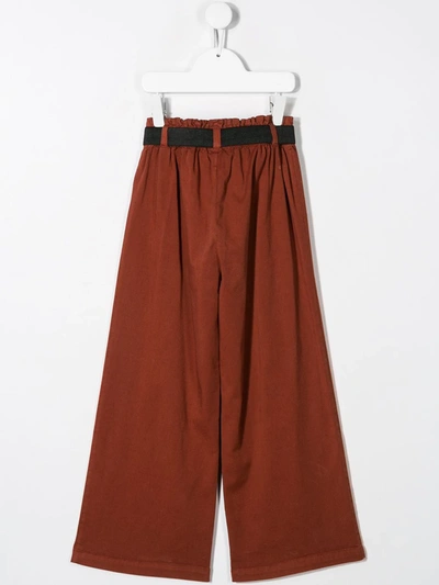 Shop Andorine Loose-fit Flared Trousers In Brown
