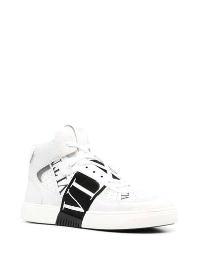 Shop Valentino Vl7n Mid-top Leather Sneakers In White