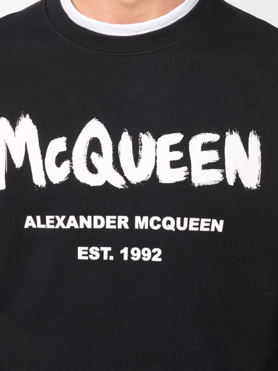 Shop Alexander Mcqueen Graffiti-print Sweatshirt In 黑色