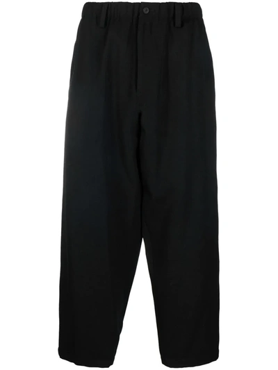 Shop Yohji Yamamoto Cropped Wool Trousers In 黑色