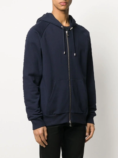 Shop Balmain Embossed Logo Zipped Hoodie In Blue