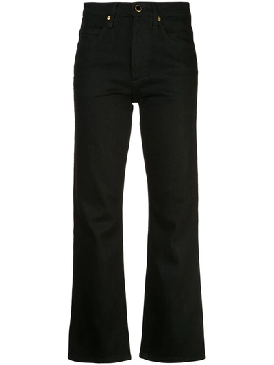 Shop Khaite The Vivian Flared Jeans In Black