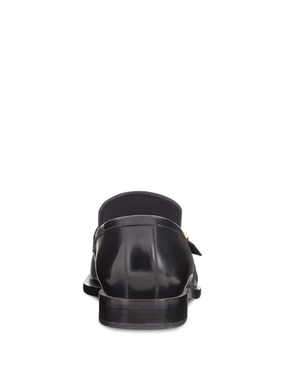 Shop Fendi Smooth Ff Detail Loafers In Black