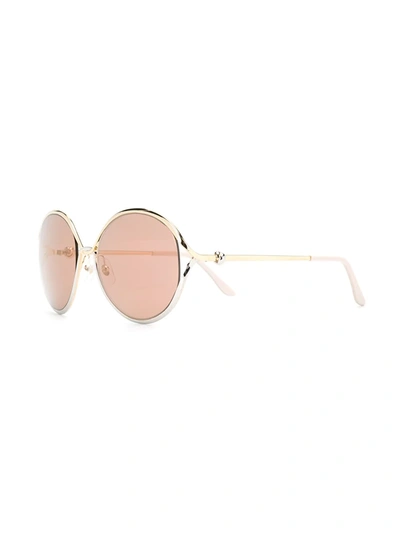 Shop Cartier Round Sunglasses In Gold