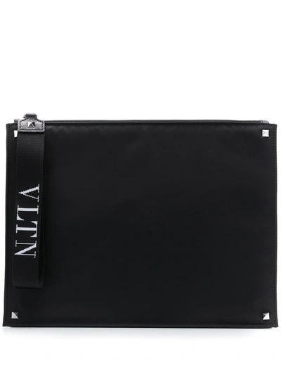 Shop Valentino Vltn Strap Clutch In Black
