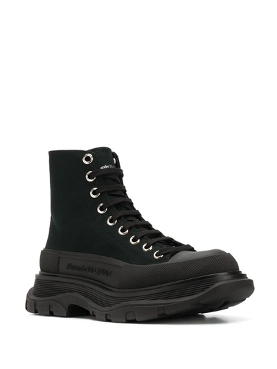Alexander Mcqueen Leather And Rubber Exaggerated-sole Ankle Boots In Black