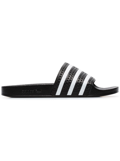 Shop Adidas Originals Adilette Three-stripe Slides In Black