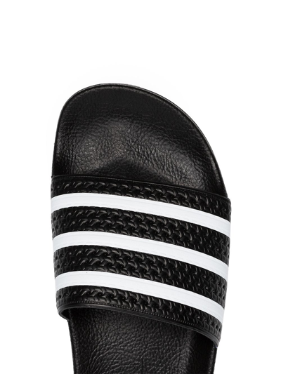 Shop Adidas Originals Adilette Three-stripe Slides In Black