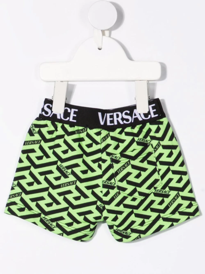 Shop Versace Greca Print Shorts In Green