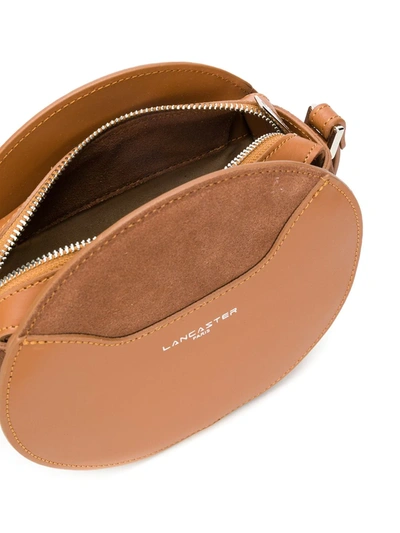 Shop Lancaster Round Crossbody Bag In Brown