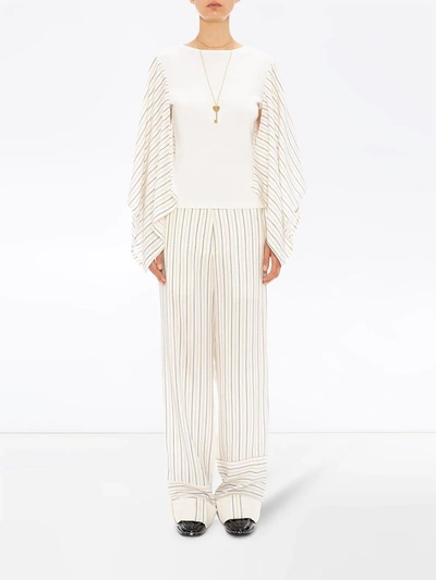 Shop Jw Anderson Patchwork Stripe Trousers In White