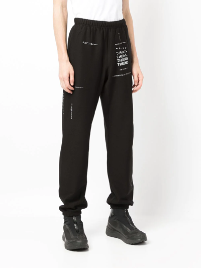 Shop Takahiromiyashita The Soloist Slogan-print Track Pants In 黑色