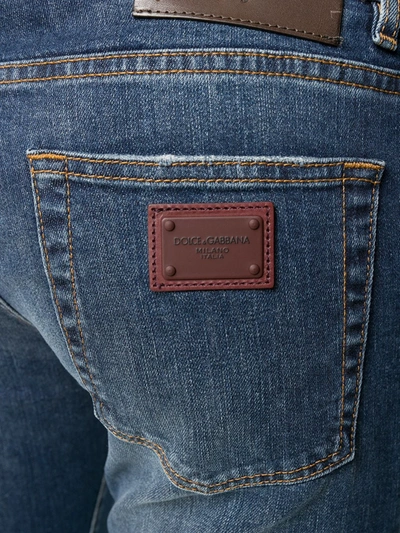 Shop Dolce & Gabbana Logo Plaque Low-waist Jeans In Blue